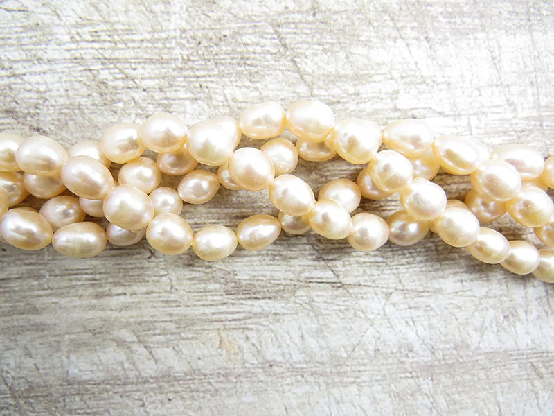104pcs Natural Freshwater Pearls 6x8mm, Light Peach color