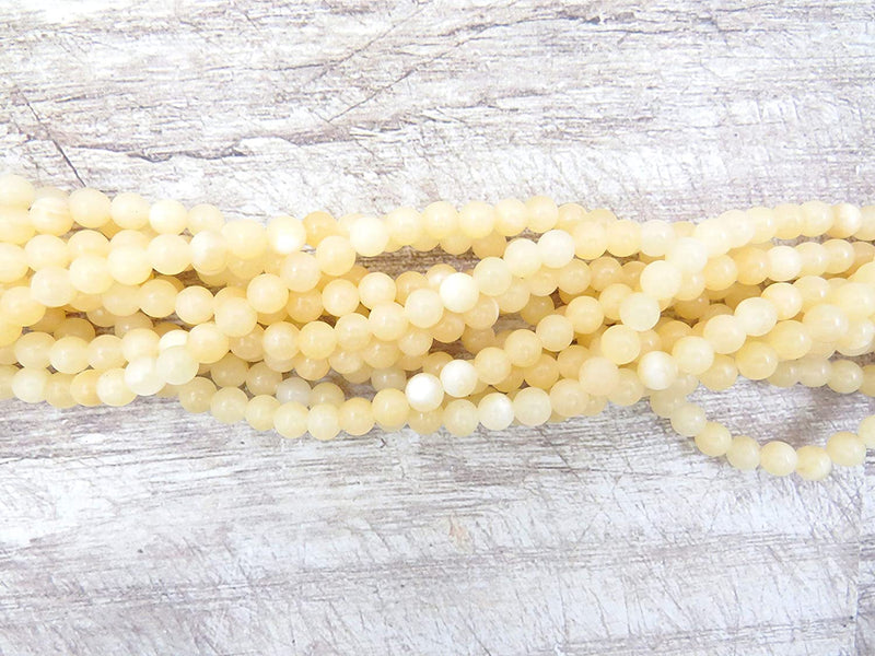 Honey Calcite Semi-precious stones 6mm round, 60 beads/15" rope (Honey Calcite 6mm 1 rope of 60 beads)